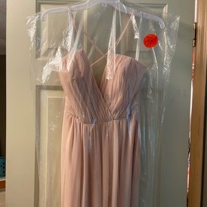 Brand new, never worn, still in the plastic bridesmaid dress.
